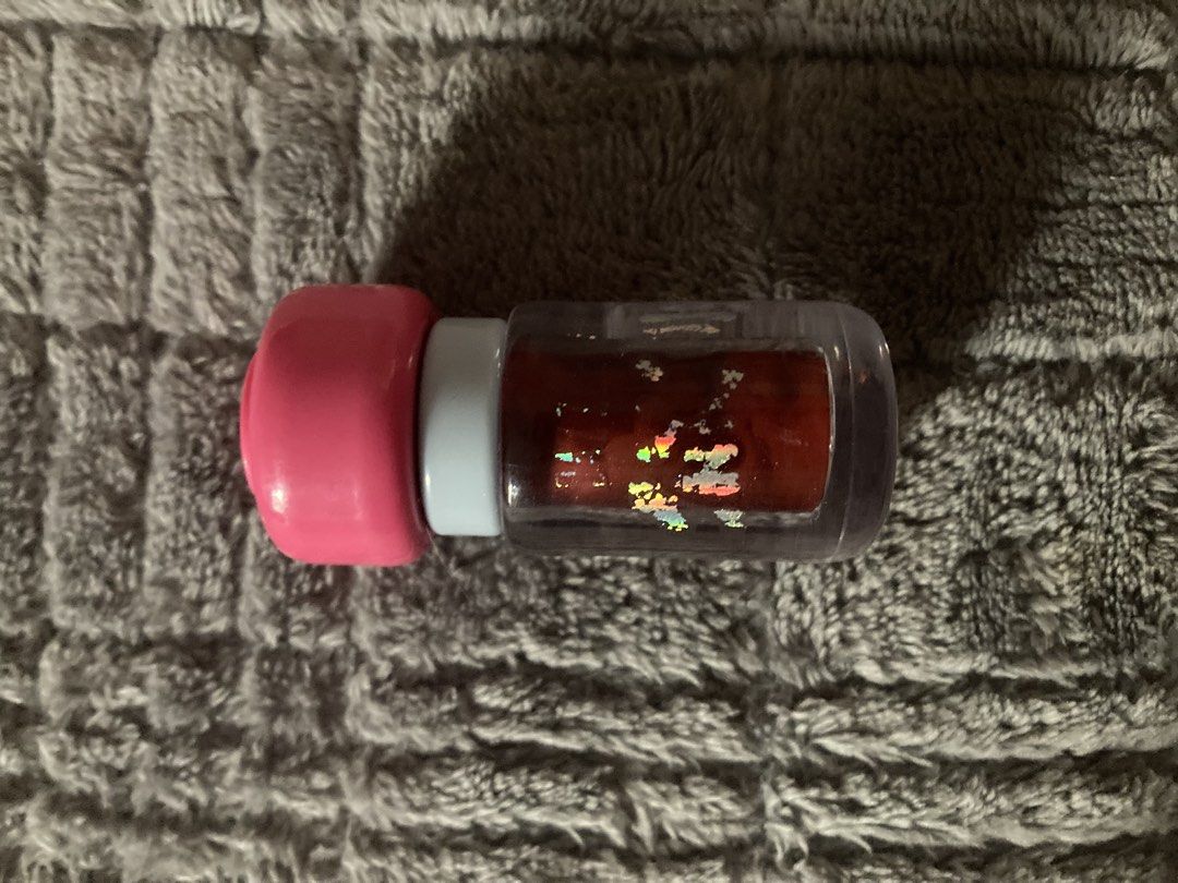 Dazzle me lip tint ink jely (Category: Makeup) located in Makati City. Submitted by wonderfindzs (Listing ID 1461669580, Image 1). Description: Shade 982.