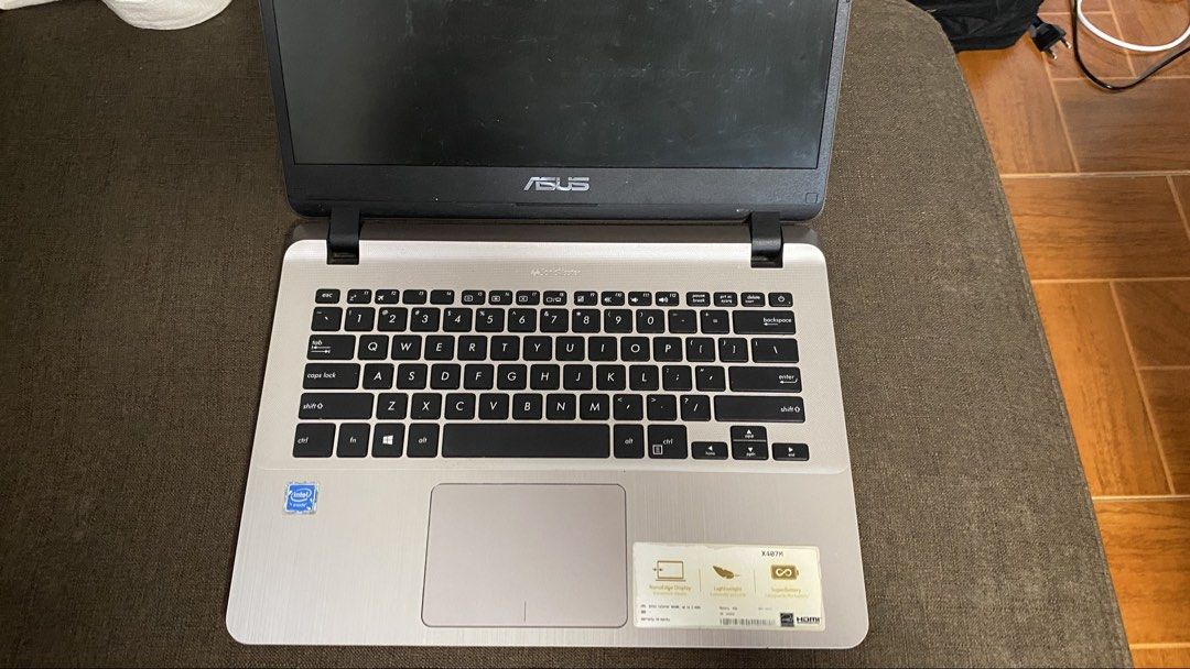 DEFECTIVE ASUS Laptop X407M (Category: Laptops & Notebooks) located in Manila. Submitted by zenearth-b9b107 (Listing ID 1461648816, Image 2). Description: need lang po pang allowance Location : Santa Cruz, Laguna Issue : Motherboard Inclusion : Charger niya j&t .