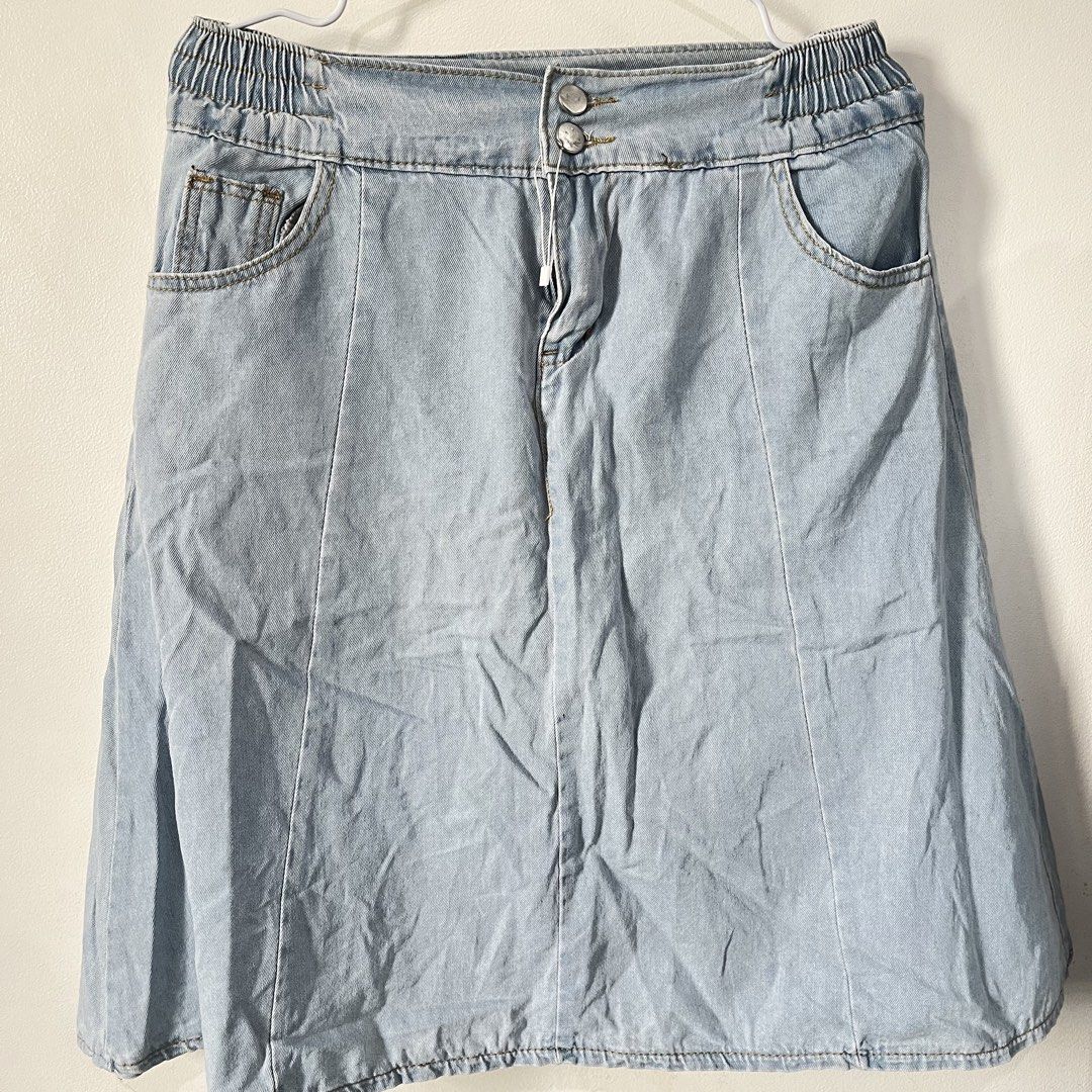 Denim A-line Garterized Skort (Category: Skirts) located in Quezon City. Submitted by shopnina (Listing ID 1461670334, Image 1). Description: - Light wash denim skirt - Flattering A-line cut - Comfortable elastic waistband (fits 28-34 inches) - Convenient front pockets - Built-in shorts for extra coverage - Approximately 23 inches in length - Ideal for everyday casual wear.