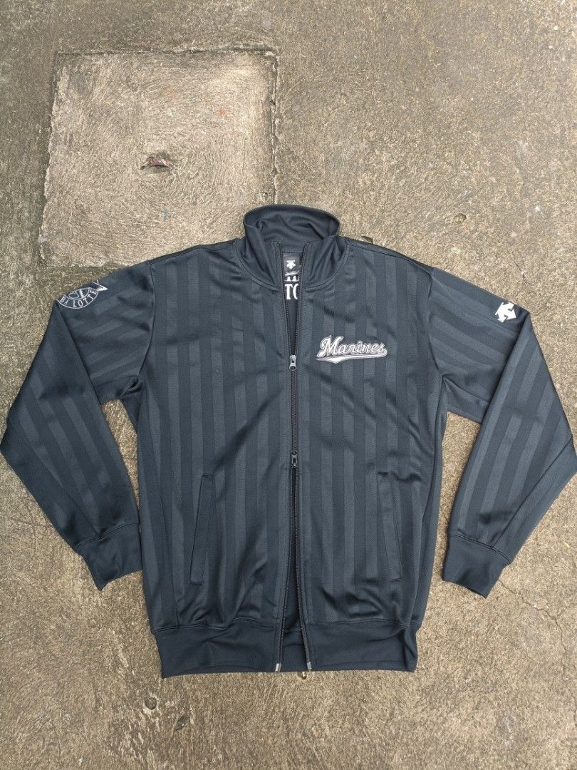Descente Chiba Lotte Marines Track Jacket (Category: Coats, Jackets and Outerwear) located in Manila. Submitted by nobi_fd75d9 (Listing ID 1461658775, Image 1). Description: - Official Descente track jacket for the Chiba Lotte Marines. - Stylish dark grey with a subtle vertical stripe pattern. - Features a full zip front for easy wear. - Convenient pockets for your essentials. - Showcases the team logo and name, perfect for fans. - Ideal for both