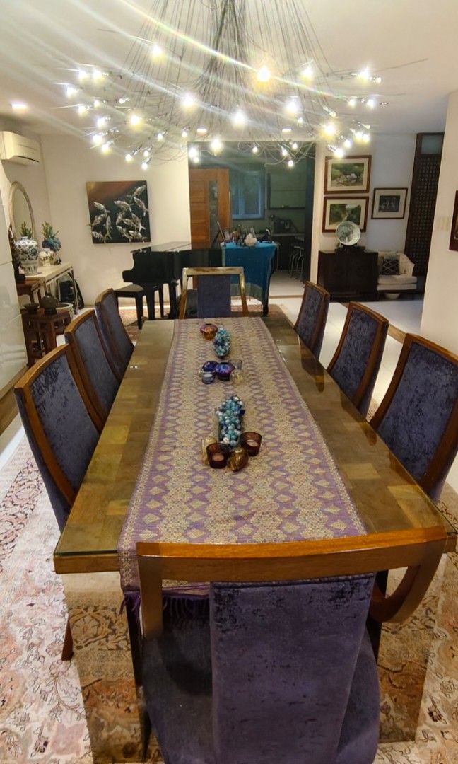 Dining table (Category: Other Home Appliances) located in Manila. Submitted by thebageditph (Listing ID 1461624274, Image 1). Description: Beautiful CUSTOMIZED SOLID WOOD 8-SEATER DINING TABLE SET 🤎 ✨ Original price: ₱120,000 ✨ Only 2 years old ✨ Customized solid wood ✨ Complete with 8 upholstered dining chairs ✨ Elegant and timeless design ✨ Well-maintained ✨ Sturdy and perfect for family dining/entertaining Selling because:moving to a smaller 