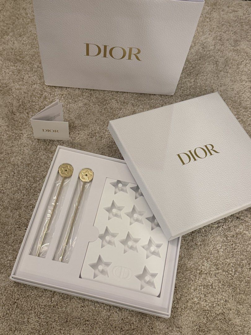 Dior Beverage Set (Gift with purchase) (Category: Dinnerware & Cutlery) located in Cavite. Submitted by Poppita (Listing ID 1461620657, Image 1). Description: - Authentic Dior set - Includes two gold stirrers with star details - Comes with a star-shaped mold - Original Dior boxes included - Brand new, never used, still in packaging - Ideal for collectors or as a gift.