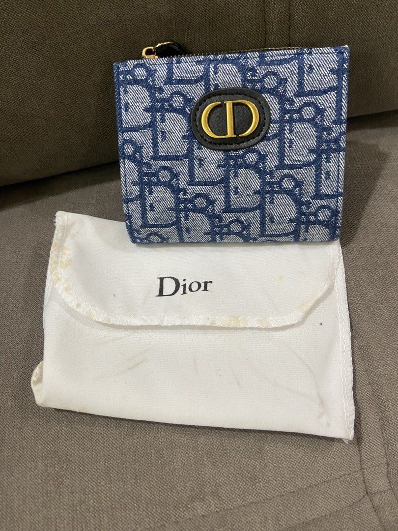Dior Monogram Denim Bifold Wallet with Pouch (Category: Luxury Bags & Wallets) located in Quezon City. Submitted by emjen (Listing ID 1461745763, Image 1). Description: - Dior wallet Authentic quality - Iconic Dior monogram pattern on denim - Bifold design with zip compartment - Interior card slots and clear ID window - Includes Dior dust pouch - Ideal for organizing your essentials.