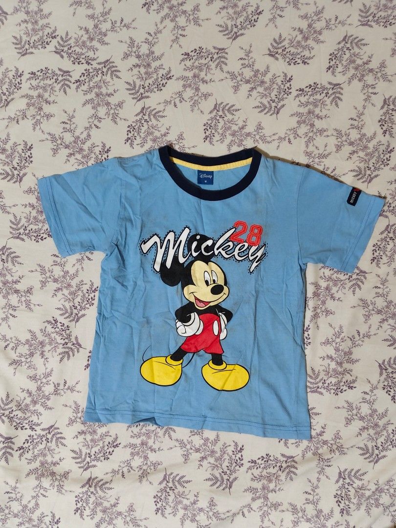 Disney Mickey Mouse light blue t-shirt (Category: Babies & Kids Fashion) located in Bulacan. Submitted by angel.decluttersx (Listing ID 1461706285, Image 1). Description: small size for adult needs wash lang.