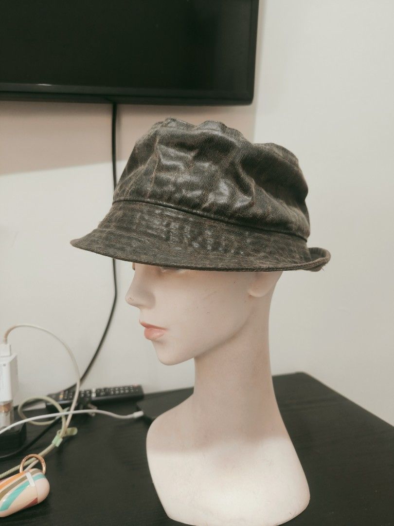 Distressed Leather Bucket Hat (Category: Caps & Hats) located in Caloocan City. Submitted by wan_l_as (Listing ID 1461604719, Image 1). Description: - Cool distressed leather bucket hat - Unique textured look - Nice tan colored inside lining - Adds edge to your outfit - Fits most head sizes comfortably - Stylish accessory for any season.