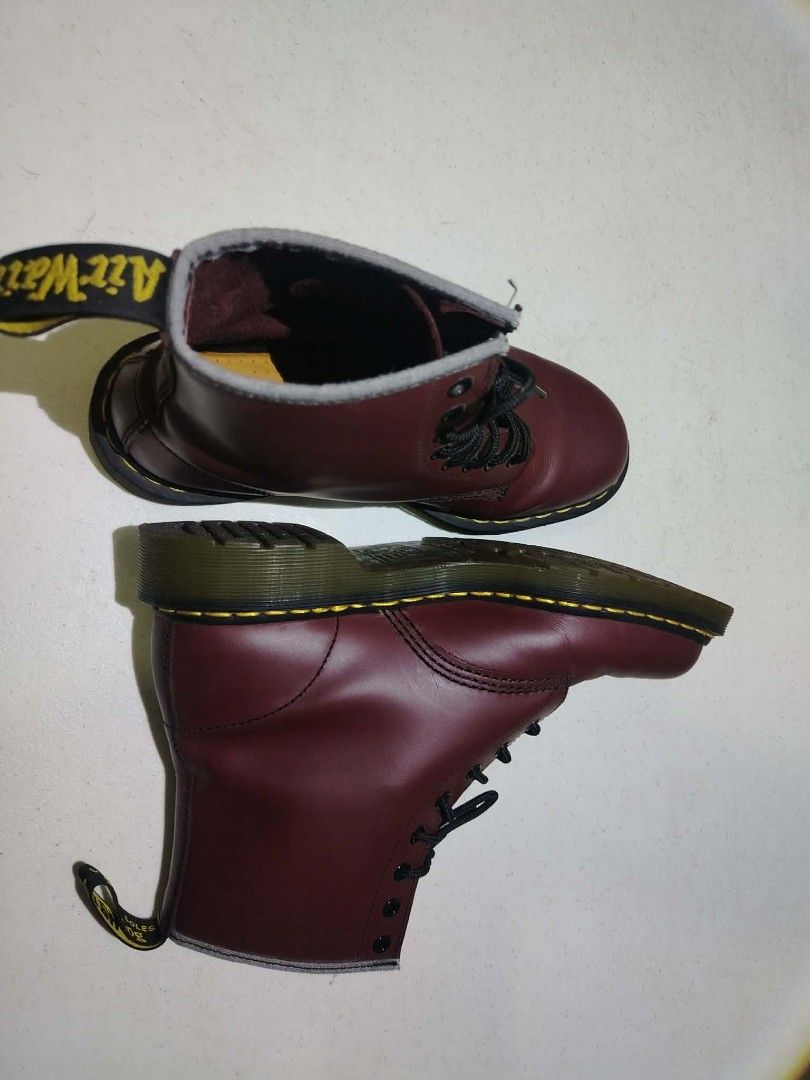 Dr. Martens 1460 Cherry Red Smooth Leather Boots (Category: Boots) located in Taal. Submitted by olnosj (Listing ID 1461709775, Image 2). Description: - Classic Dr. Martens 1460 boots - Color: Cherry Red Smooth Leather - Size: UK 8 (US Men 9, US Women 10, EU 42) - Features: Iconic yellow stitching, air-cushioned sole - Perfect for: Everyday wear.