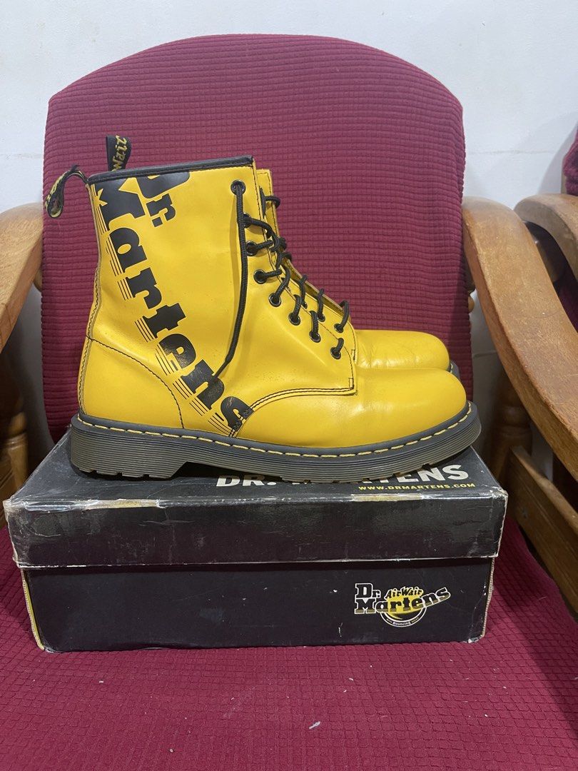 Dr. Martens 1460 Yellow Smooth Leather Boots (Category: Boots) located in Davao. Submitted by rcgulanes.moon (Listing ID 1461734643, Image 2). Description: - Classic Dr. Martens 1460 boots - Vibrant bright yellow color - Smooth leather upper - Iconic air-cushioned sole - Dr. Martens logo printed on the side - Includes original box - Secure lace-up closure - Adds a pop of color to any outfit.