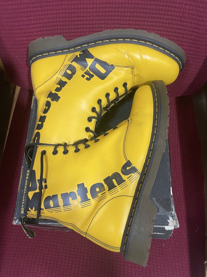 Dr. Martens 1460 Yellow Smooth Leather Boots (Category: Boots) located in Davao. Submitted by rcgulanes.moon (Listing ID 1461734643, Image 3). Description: - Classic Dr. Martens 1460 boots - Vibrant bright yellow color - Smooth leather upper - Iconic air-cushioned sole - Dr. Martens logo printed on the side - Includes original box - Secure lace-up closure - Adds a pop of color to any outfit.