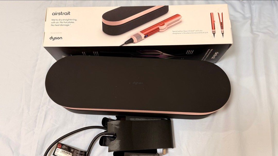 Dyson Airstrait in strawberry bronze (Category: Hair) located in Paranaque City. Submitted by shop_tinascloset (Listing ID 1461656680, Image 1). Description: Dyson Airstraight in strawberry bronze just bought las year! -Complete with box it came with. All pics as is. Used this for only less than 10x then just stored in my closet, i reach out for my airwrap more! Comes with the receipt so you can still have the airstraight box hot stamped in certa