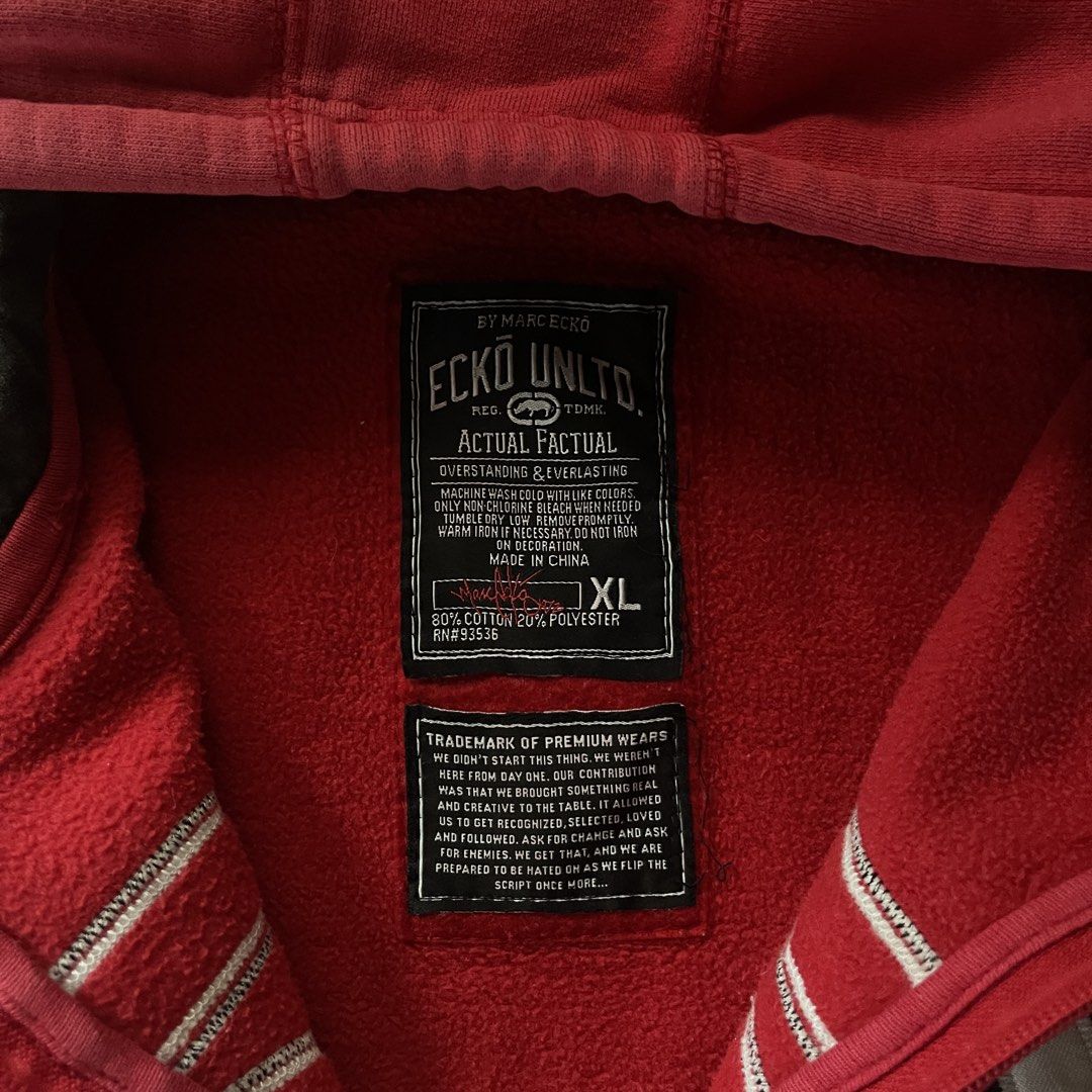 Ecko Unltd. Red Zip-Up Hoodie (Category: Hoodies) located in Manila. Submitted by deymdaniel (Listing ID 1461593457, Image 2). Description: 25 width 30 length Other side of zipper puller is missing. - Classic red Ecko Unltd. zip-up hoodie - Features iconic rhino logo on the front - "ECKO UNLTD." text on the sleeves - Size: XL - Made in China - Perfect for casual wear.