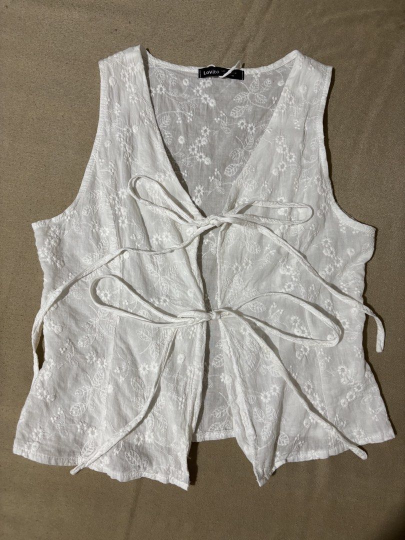 Embroidered vest top (Category: Sleeveless) located in Manila. Submitted by violet04 (Listing ID 1461562597, Image 1). Description: Lovito top can fit xs-s frame.