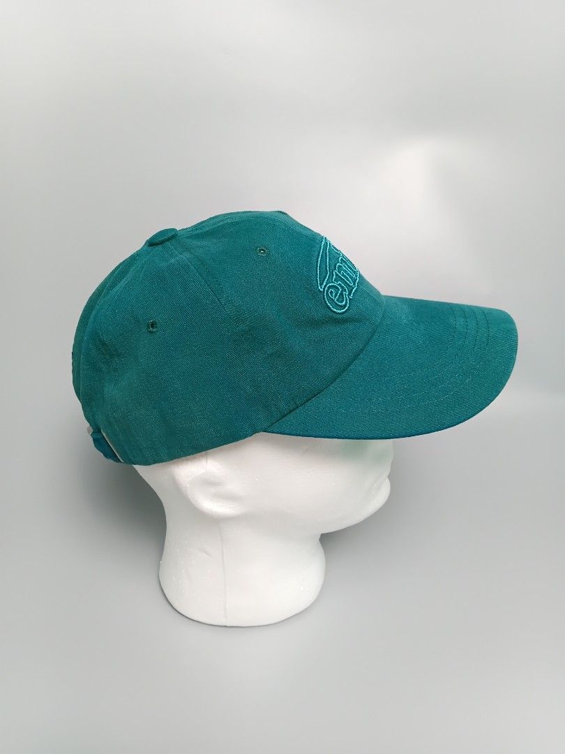 EMIS Cotton Brushed Ball Cap in Green. [ (Category: Caps & Hats) located in Manila. Submitted by hustler_777 (Listing ID 1461728413, Image 2). Description: EMIS (Every Moment Is Special) is an incredibly popular South Korean lifestyle brand frequently worn by K-pop idols and celebrities. This specific model stands out because of its unique texture and tone-on-tone coloring. Key Features Fabric Composition: Crafted from 100% premium cotton fleece.