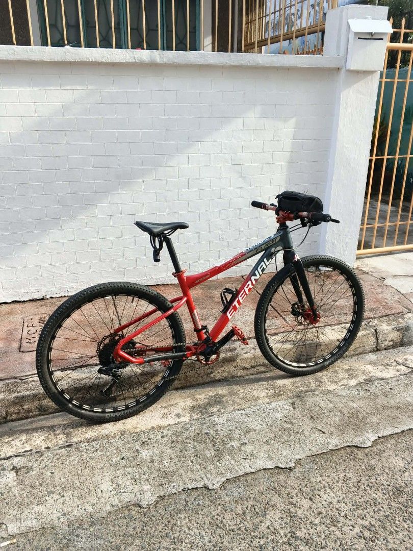Eternal Mountain Bike - Red (Category: Bicycles) located in Manila. Submitted by calmfish.60b4d8 (Listing ID 1461606693, Image 2). Description: ‎ALLOY FRAME ETERNAL 27 ‎ALLOY STEM ‎ALLOY HandleBar ‎ALLOY Headset MOSSO ‎ALLOY RIGID FORK HASSN ‎ALLOY Pedal ‎ALLOY RIM ETERNAL ‎ALLOY HUBS TANKE 6-PAWL ‎1 x 10 SPEED ‎LTWOO A7 SHIFTER ‎LTWOO RD ‎160 ROTOR ‎INTERNAL CABLING ‎FALCON TIRE 80% ‎NEW SEATPOST & SADDLE ‎HOLLOWTECH crankset ‎TANKE Hydraulic br