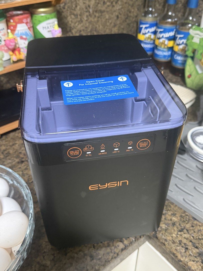 Eysin Portable Countertop Ice Maker (Category: Refrigerators and Freezers) located in Manila. Submitted by lovely_parrot (Listing ID 1461712478, Image 1). Description: - Makes ice quickly! - Choose between small or large ice cubes. - Easy to use with simple ON/OFF, cleaning, ice fill, and water add buttons. - Great for parties or everyday use. - Compact design fits on your countertop. - Last Price 700.
