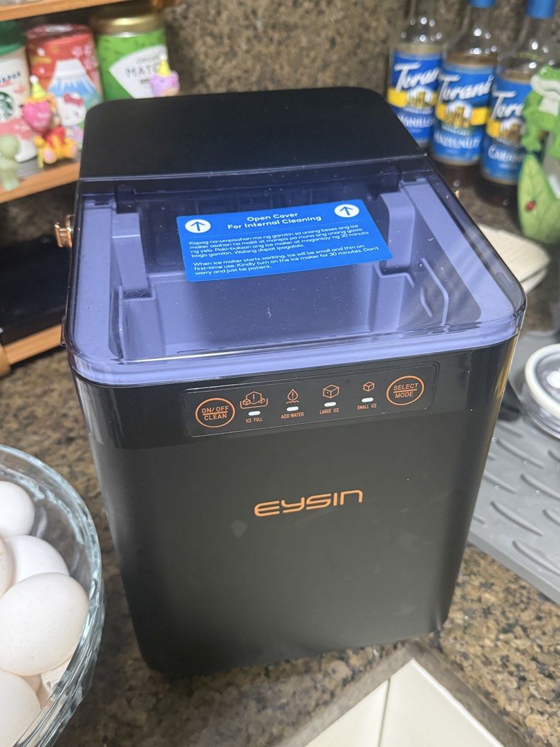 Eysin Portable Countertop Ice Maker (Category: Refrigerators and Freezers) located in Manila. Submitted by lovely_parrot (Listing ID 1461712478, Image 2). Description: - Makes ice quickly! - Choose between small or large ice cubes. - Easy to use with simple ON/OFF, cleaning, ice fill, and water add buttons. - Great for parties or everyday use. - Compact design fits on your countertop. - Last Price 700.