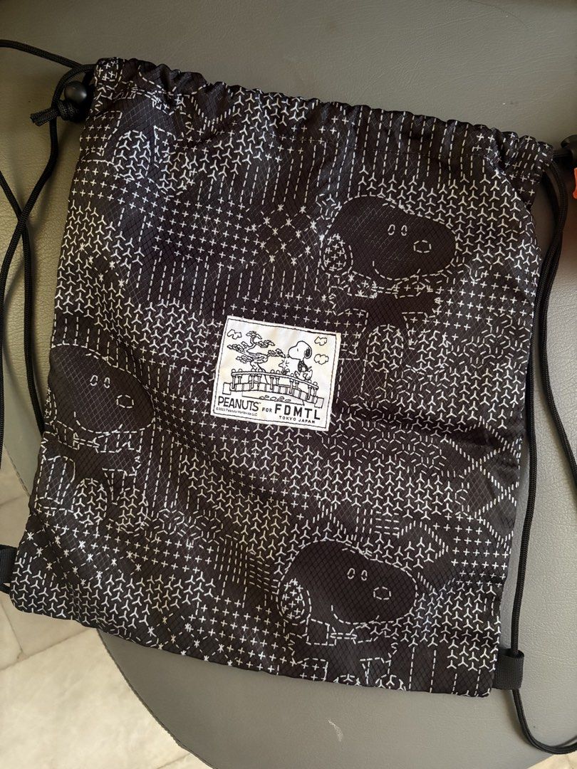 FDMTL x PEANUTS Snoopy Drawstring Bag (Category: Cross-body Bags) located in Cabanatuan. Submitted by esnyupi (Listing ID 1461613123, Image 1). Description: Spx for cheaper sf Maribank/gcash/may.