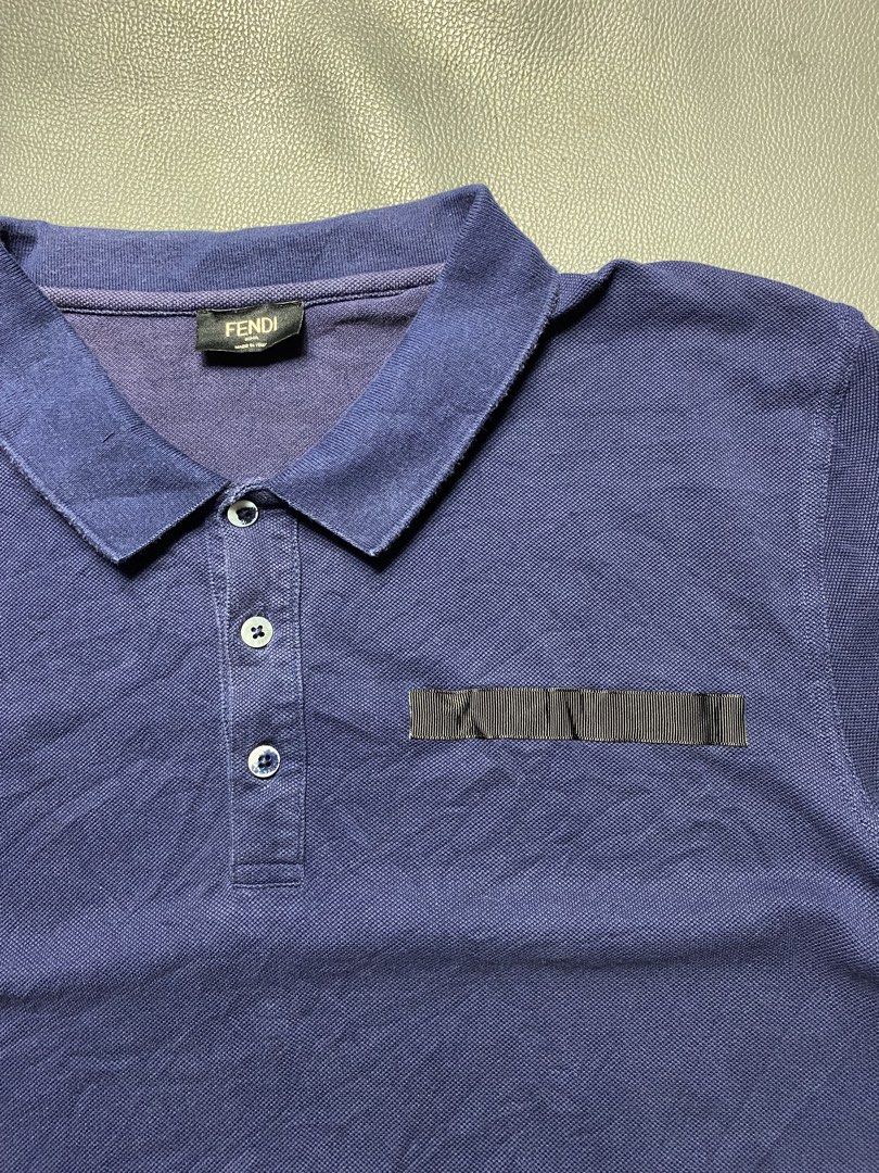 Fendi Navy Blue Polo Shirt (Category: Tshirts & Polo Shirts ) located in Manila. Submitted by adrialesdrip (Listing ID 1461730935, Image 3). Description: Fendi polo shirt Size 54 Width 23 Length 30 Condition good Color rate 9 See pics all details .