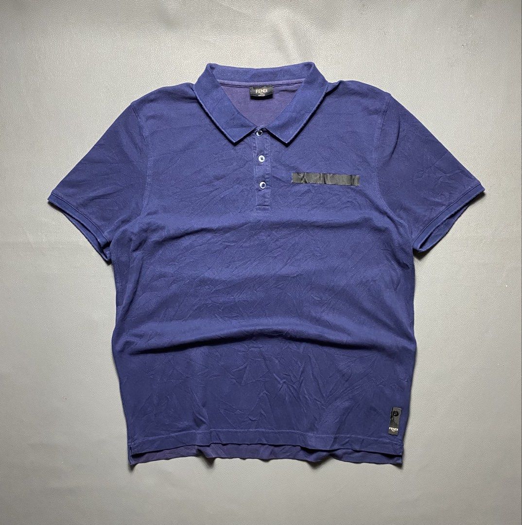 Fendi Navy Blue Polo Shirt (Category: Tshirts & Polo Shirts ) located in Manila. Submitted by adrialesdrip (Listing ID 1461730935, Image 1). Description: Fendi polo shirt Size 54 Width 23 Length 30 Condition good Color rate 9 See pics all details .
