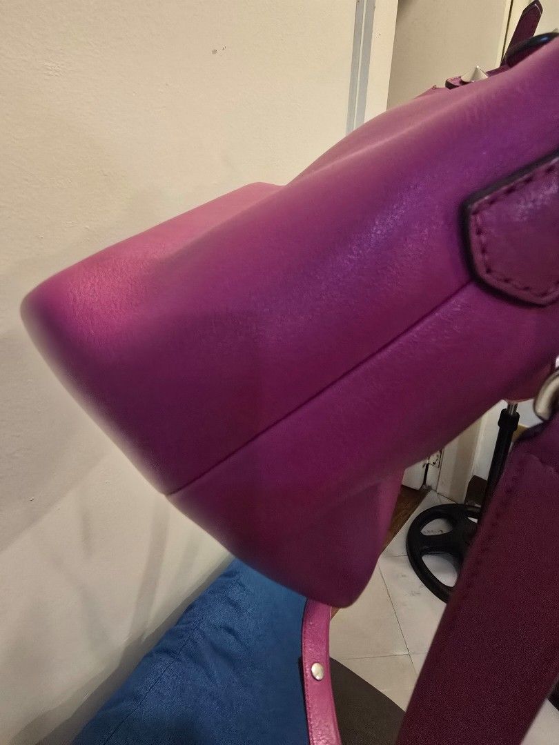 Fendi by the way (Category: Luxury Bags & Wallets) located in Manila. Submitted by CLLcloset (Listing ID 1461691787, Image 2). Description: - Authentic Fendi bag in vibrant pink - Genuine leather material - Fendi logo on zipper pull - Top handle and detachable shoulder strap - Spacious interior for essentials - Stylish accessory for any occasion.
