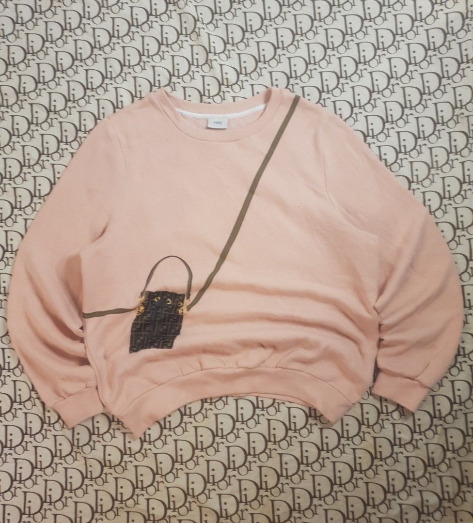Fendi Roma bag design sweater (Category: Luxury Apparel) located in San Fernando. Submitted by retro.district. (Listing ID 1461776454, Image 1). Description: - Fendi sling bag design sweater - Size: XL (women's) - Condition: Excellent - no issue - Color Rate: 9.5/10.