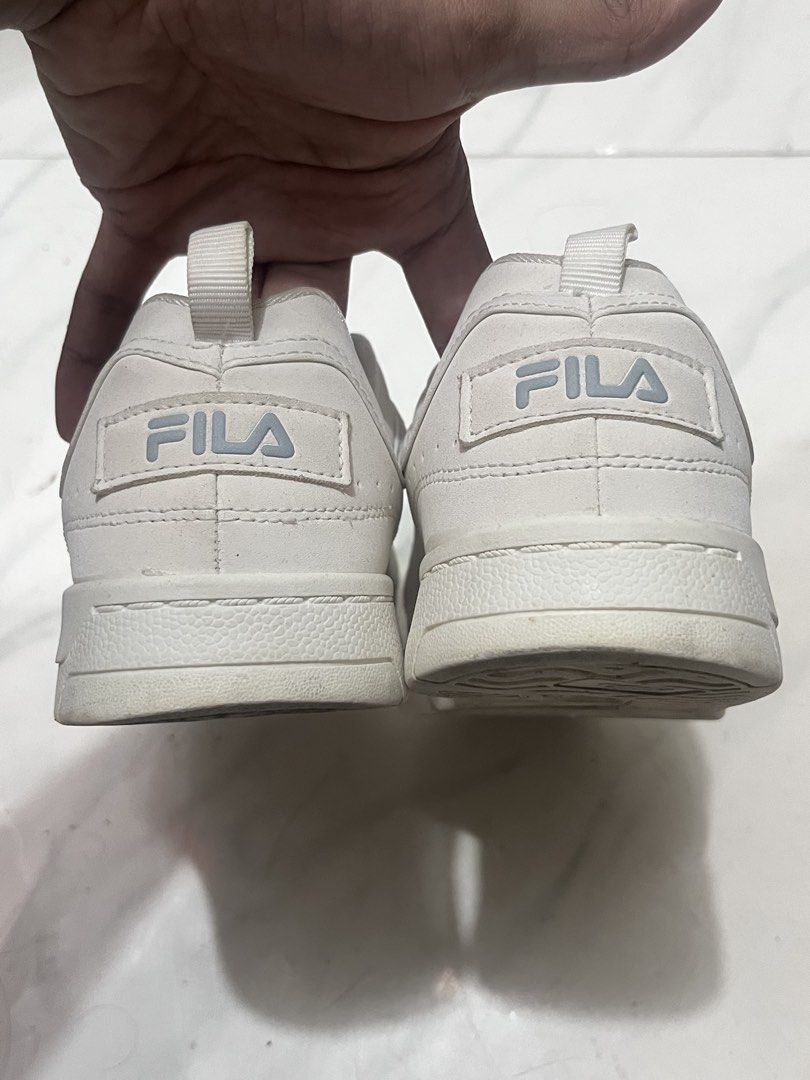 Fila White Sneakers US 6 (Category: Sneakers) located in Manila. Submitted by watchap.ketchup (Listing ID 1461593740, Image 2). Description: - White Fila sneakers - Size: US 6 / EUR 36 / UK 3.5 - Style Number: 52HE503723 - Color Code: 212 - Ideal for everyday wear - Note: Some signs of use on the soles.