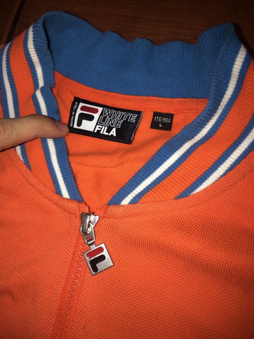 Fila Zip Up Jacket (Category: Coats, Jackets and Outerwear) located in San Juan City. Submitted by prettyboi_ (Listing ID 1461598698, Image 3). Description: GOOD CONDITION OVERALL COLOR RATE 9/10 NO ISSUE SIZE LARGE ON TAG SAN JUAN CITY LOCATION VIA LALAMOVE SF YOURS.