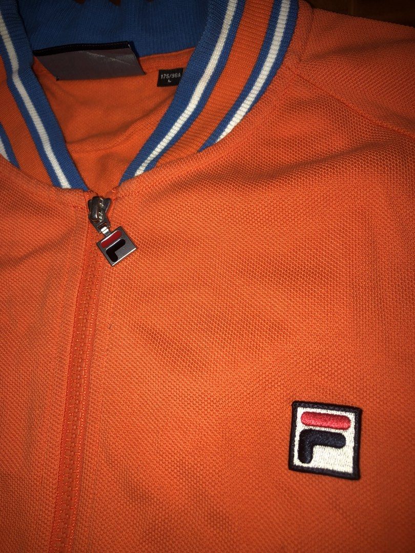 Fila Zip Up Jacket (Category: Coats, Jackets and Outerwear) located in San Juan City. Submitted by prettyboi_ (Listing ID 1461598698, Image 2). Description: GOOD CONDITION OVERALL COLOR RATE 9/10 NO ISSUE SIZE LARGE ON TAG SAN JUAN CITY LOCATION VIA LALAMOVE SF YOURS.