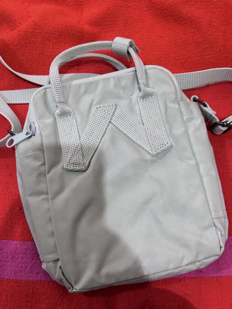 Fjallraven Kanken Mini Backpack in Mint Green (Category: Backpacks) located in Manila. Submitted by jellyycrd (Listing ID 1461664632, Image 2). Description: • Mint green • Features a main zippered compartment, a quick-access front pocket, and a secure rear pocket for a phone or small tablet. • Can fit kindle • Adjustable straps • Needs light cleaning RFS: De-cluttering/not using anymore .