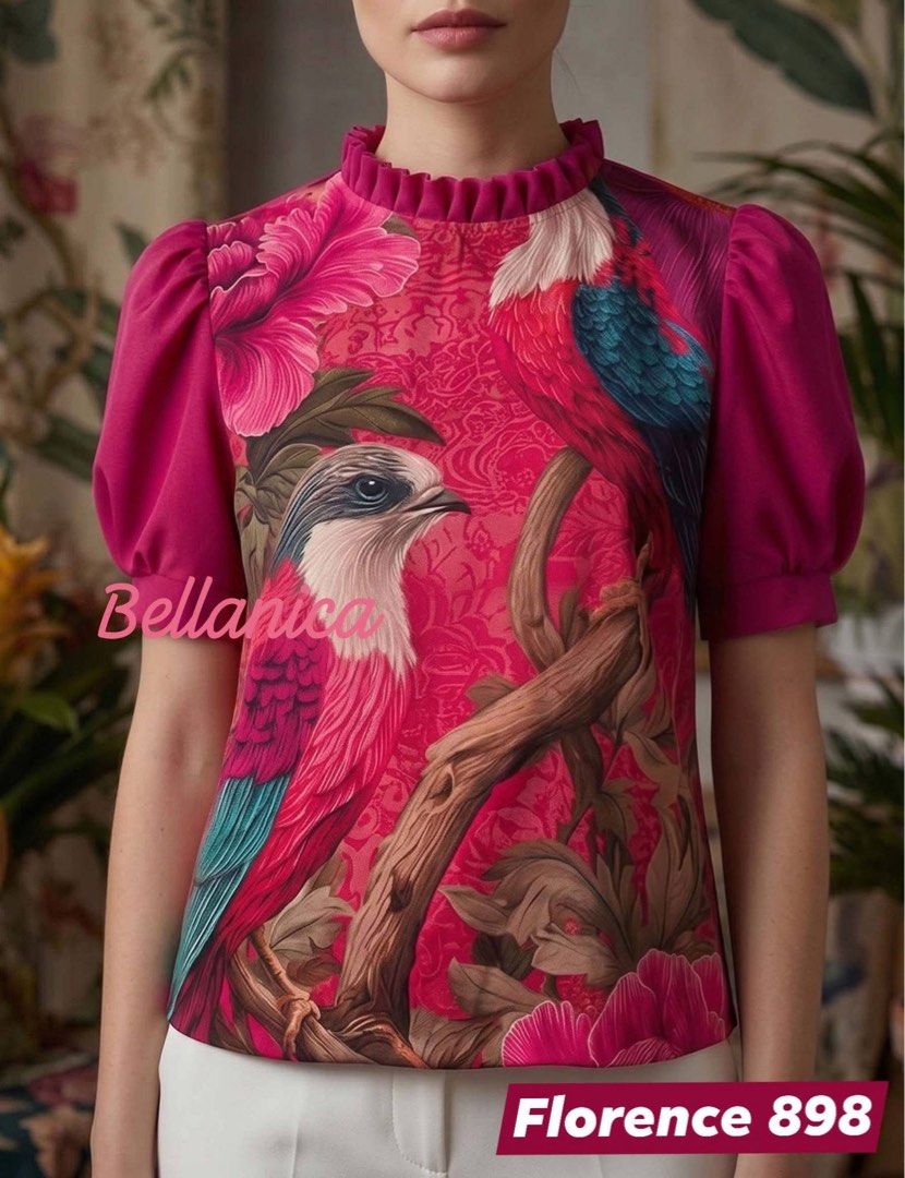 Florence 898 Bird Print Blouse (Category: Blouses) located in Taguig. Submitted by happy.viascloset (Listing ID 1461779412, Image 2). Description: - Eye-catching bright pink blouse - Beautiful bird and floral print - Features stylish puff sleeves - Elegant ruffled neckline - Unique and vibrant design - Perfect for dressing up or down - Adds a pop of color to your outfit.