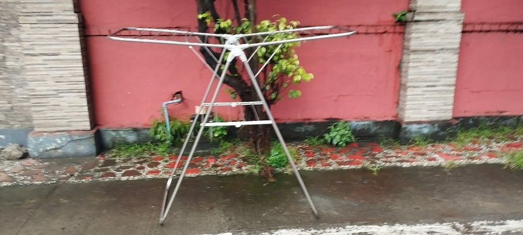 Foldable Stainless Steel Drying Rack for Clothes (Category: Clothes Drying Rack) located in Manila. Submitted by benjie.benjie3 (Listing ID 1461601406, Image 2). Description: - Foldable Drying Rack - Made of durable Stainless Steel - Sturdy and can hold a good amount of laundry - Easy to set up and fold away for storage - Ideal for apartments and small spaces - Versatile for drying clothes, towels, or blankets Folding laundry drying Rack Pure Sta