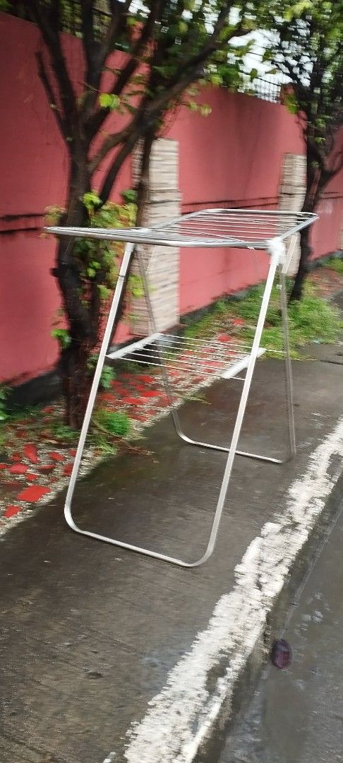 Foldable Stainless Steel Drying Rack for Clothes (Category: Clothes Drying Rack) located in Manila. Submitted by benjie.benjie3 (Listing ID 1461601406, Image 1). Description: - Foldable Drying Rack - Made of durable Stainless Steel - Sturdy and can hold a good amount of laundry - Easy to set up and fold away for storage - Ideal for apartments and small spaces - Versatile for drying clothes, towels, or blankets Folding laundry drying Rack Pure Sta