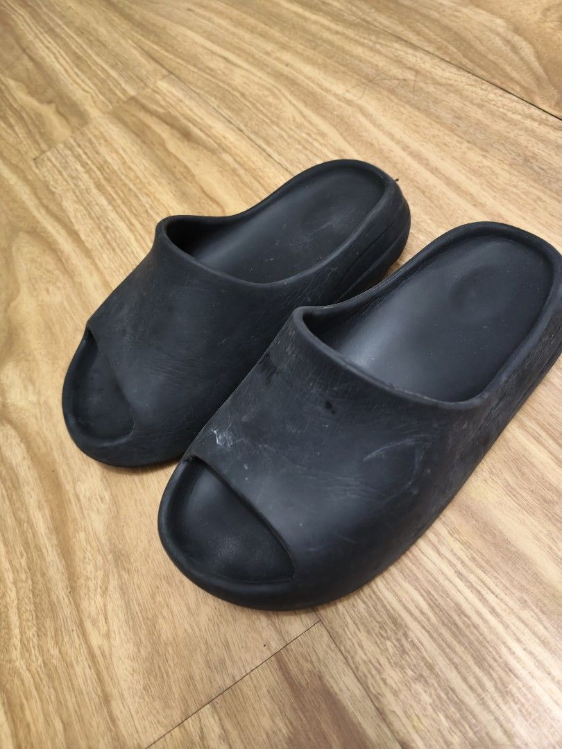 For sale Black Slides Sandals (Category: Flats & Sandals) located in Mandaluyong City. Submitted by derekalava (Listing ID 1461784358, Image 3). Description: - For sale Black Slides Sandals Comfortable black slides - Easy to slip on and off - Ideal for casual wear - Shows some signs of wear on the soles (please check photos for details) if interested please call txt or pm me see pics for the condition thank you.