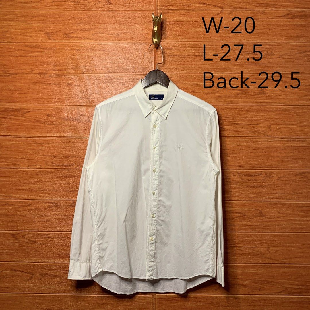 Fred Perry Mono white Button down (Category: Formal Shirts) located in Quezon City. Submitted by donklasiko (Listing ID 1461573003, Image 2). Description: Condition: 9.5+/10 Pristine condition Issue: non Refer to the dimension 🤗 PM FOR MORE DETAILS NO RETURN, NO EXCHANGE & NO REFUND! ✅I ALSO ACCEPT TRADE/SWAP TO ANYTHING JUST DROP YOUR OFFER Please manage your expectations, this is a secondhand item. What you see is what you get 😊 💵MOP: GCASH,
