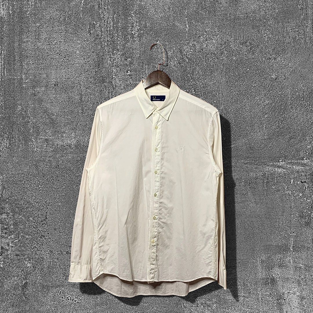 Fred Perry Mono white Button down (Category: Formal Shirts) located in Quezon City. Submitted by donklasiko (Listing ID 1461573003, Image 1). Description: Condition: 9.5+/10 Pristine condition Issue: non Refer to the dimension 🤗 PM FOR MORE DETAILS NO RETURN, NO EXCHANGE & NO REFUND! ✅I ALSO ACCEPT TRADE/SWAP TO ANYTHING JUST DROP YOUR OFFER Please manage your expectations, this is a secondhand item. What you see is what you get 😊 💵MOP: GCASH,