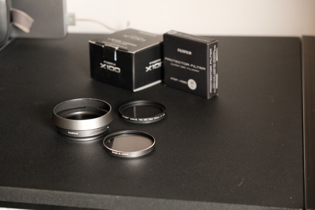 Fujifilm X100v accesories (Category: Camera Bags & Carriers) located in Cavite. Submitted by teejjay (Listing ID 1461596180, Image 3). Description: fujifilm lenshood fujifilm filter 4 black mist filter with box .