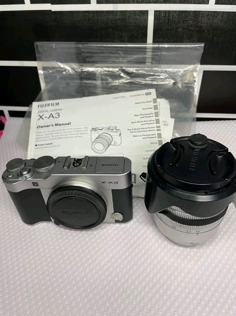 FUJIFILM (XA3) (Category: Cameras) located in Quezon City. Submitted by slapshock22 (Listing ID 1461792934, Image 1). Description: 📸 Fujifilm X-A3 — For Sale ✅ Fujifilm X-A3 — Mirrorless Camera ✅ 24.2MP APS-C Sensor — crisp, vibrant photos ✅ Classic brown & silver body — lightweight, easy to carry ✅ Built-in WiFi — share photos instantly ✅ Great colors straight from camera — perfect for portraits, travel, daily shots ✅ Comes with lens, battery, 