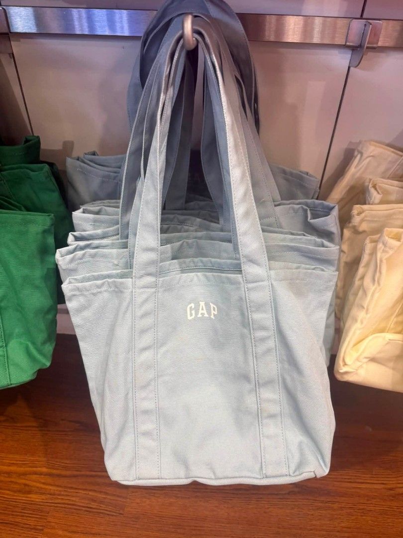 GAP Canvas Tote Bag - Various Colors Available (Category: Tote Bags) located in Manila. Submitted by assylla_ean (Listing ID 1461630678, Image 3). Description: - Cute GAP canvas tote bags - Available colors: Light Yellow, Lavender, Light Blue - Features embroidered GAP logo on the front - Made of sturdy canvas material - Perfect for everyday use - Spacious interior for essentials - Limited availability, get yours now!.