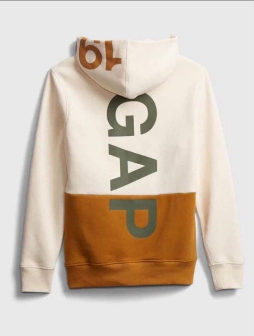 GAP Colorblock Hoodie "196" Logo (Category: Coats, Jackets and Outerwear) located in Manila. Submitted by jayveepas (Listing ID 1461668628, Image 1). Description: - GAP cream and tan colorblock hoodie - Features 'GAP' logo vertically on the back - '196' detail on the hood - Ribbed cuffs and hem for a snug fit - Made from soft and comfortable material - Ideal for everyday casual wear.