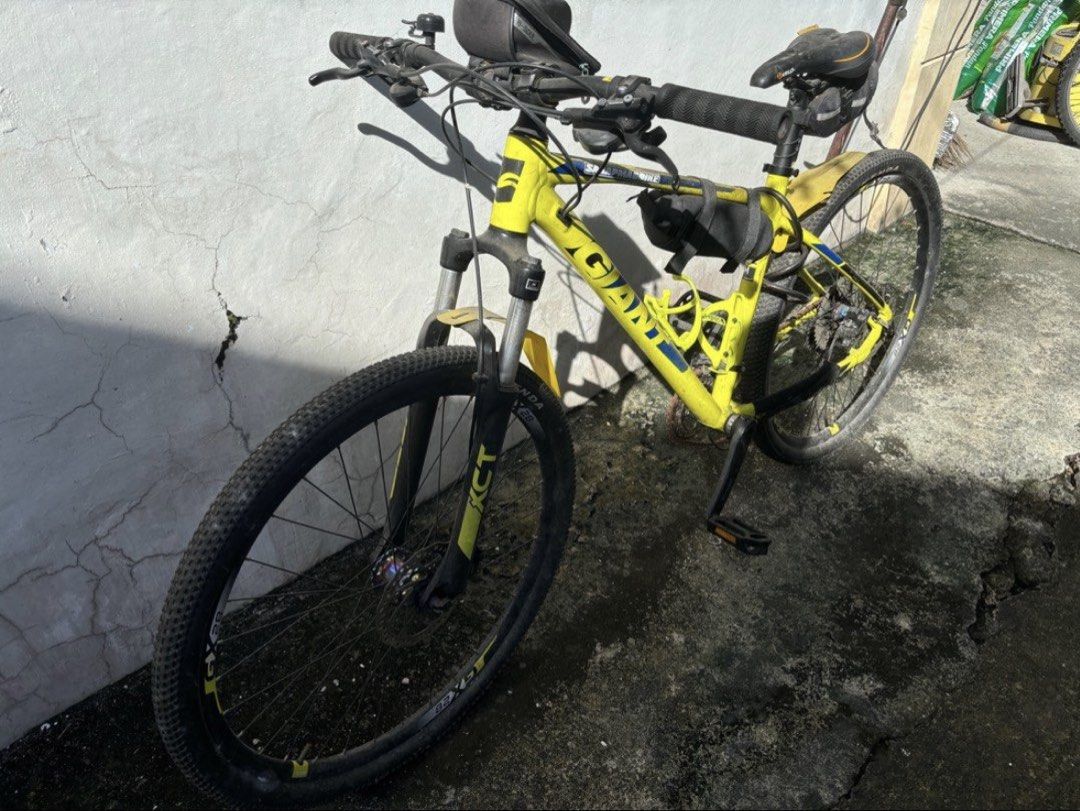 Giant ATX Deore 27.5 Medium Yellow (Category: Bicycles) located in Manila. Submitted by geofmloza (Listing ID 1461720429, Image 1). Description: PRICE: ₱12,000 LOCATION: Bacoor, Cavite SPECS & UPGRADES: Frame: Giant ATX Aluminum (Size Medium, Yellow) Wheelset: 27.5 Stock rims with Speedone Soldier Oilslick Hubs (32H, 6 Pawls - Tunog Mayaman!) Drivetrain: Shimano Deore M4100 2x10 Setup • RD: Shimano Deore M4120 SGS • FD: Shimano Deore M4100-M • Sh