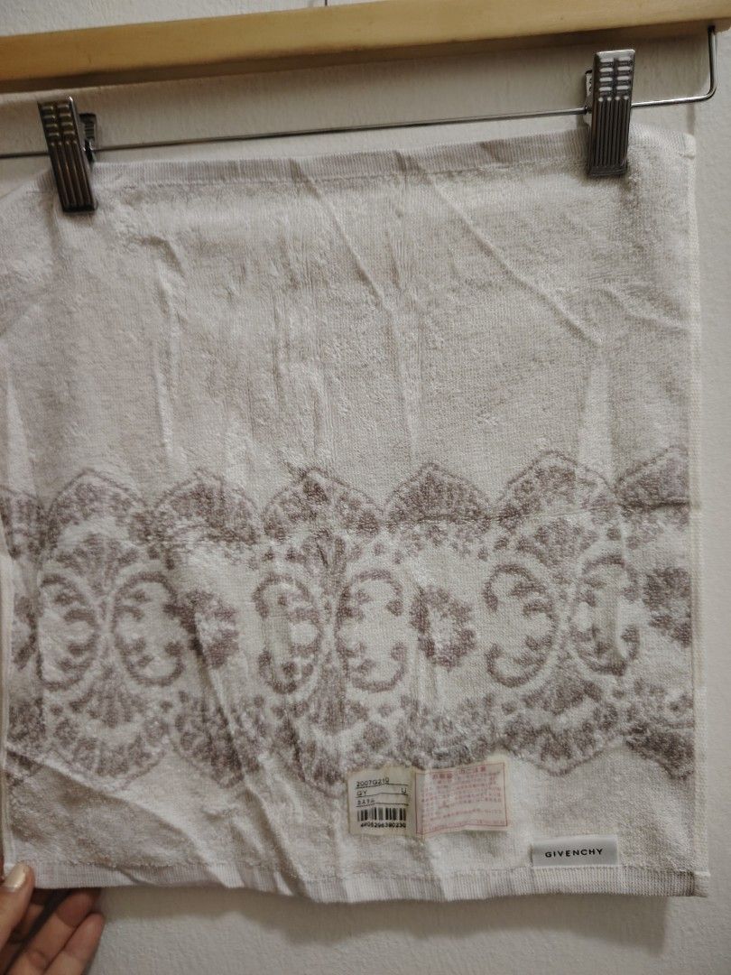 Givenchy (Category: Other Accessories) located in Perai. Submitted by sweeties2433 (Listing ID 1461625175, Image 3). Description: - Brand: Givenchy - Material: Cotton - Design: Features a beautiful lace-inspired pattern and embroidered Givenchy logo - Condition: Excellent, gently used - Feel: Soft and luxurious - Perfect for: Everyday use, adding a touch of designer elegance.