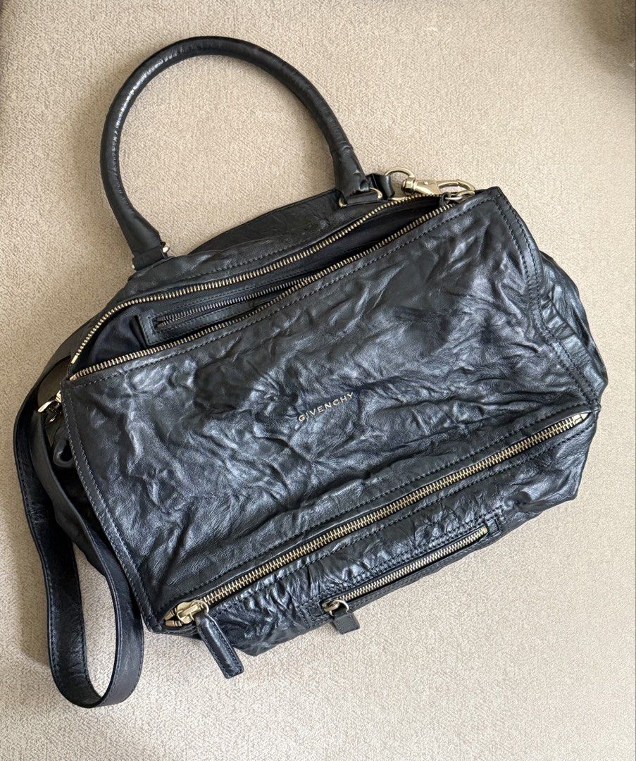 Givenchy Pandora (Large) (Category: Luxury Bags & Wallets) located in Santa Rosa. Submitted by jashiesells (Listing ID 1461601857, Image 1). Description: Authentic Givenchy Pandora Large Recolored from brown Comes with dust bag RFS: Decluttering and outgrown from collection. .