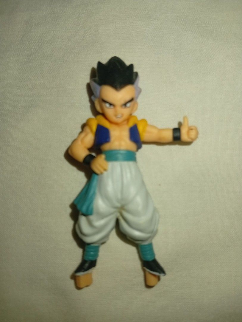 Gotenks Dragon Ball Figure Collection (Category: Figurines & Statues) located in Tarlac. Submitted by kaizer_rabbit (Listing ID 1461716023, Image 1). Description: Character: Gotenks (Base Form) Franchise: Dragon Ball Z (Majin Buu Saga) Manufacturer: BANDAI Release Year: 2004 Lineup: "Dragon Ball Collection Vol. 3" Classification: Candy Toy / Capsule Gashapon Figure.