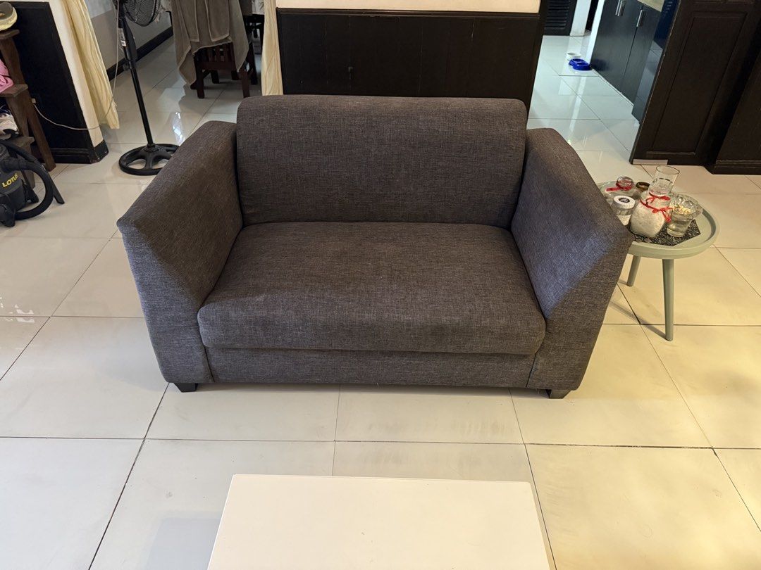 Grey Fabric L-Shaped Sofa with Chaise (Category: Sofas) located in Las Pinas. Submitted by whoshotcupid (Listing ID 1461591980, Image 2). Description: - Comfortable grey fabric sofa - Features a chaise lounge for extra lounging space - Comes with 3 decorative throw pillows - Ideal for living rooms or apartments.