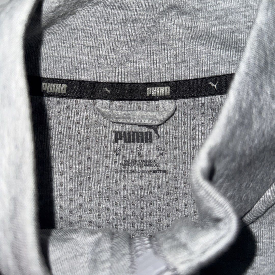 T7 Grey Puma Track Jacket with White Stripes (Category: Coats, Jackets and Outerwear) located in Manila. Submitted by monkemon (Listing ID 1461584575, Image 3). Description: - Grey Puma track jacket - White stripes on sleeves and shoulders - Full zip closure - Two front pockets - Comfortable material - Ideal for casual wear or sports.
