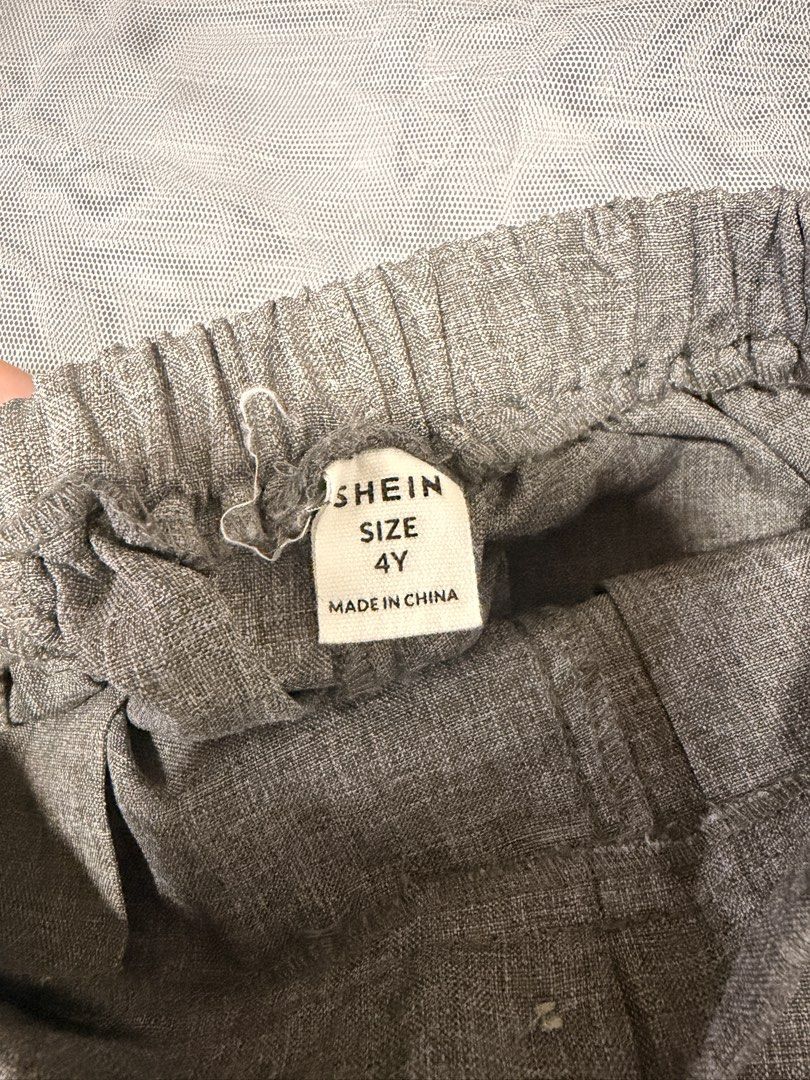 Grey Trouser Pants (Category: Babies & Kids Fashion) located in Caloocan City. Submitted by mrynn_declutter (Listing ID 1461618783, Image 2). Description: Color: Gray Size: 2-4 years old Shein brand.