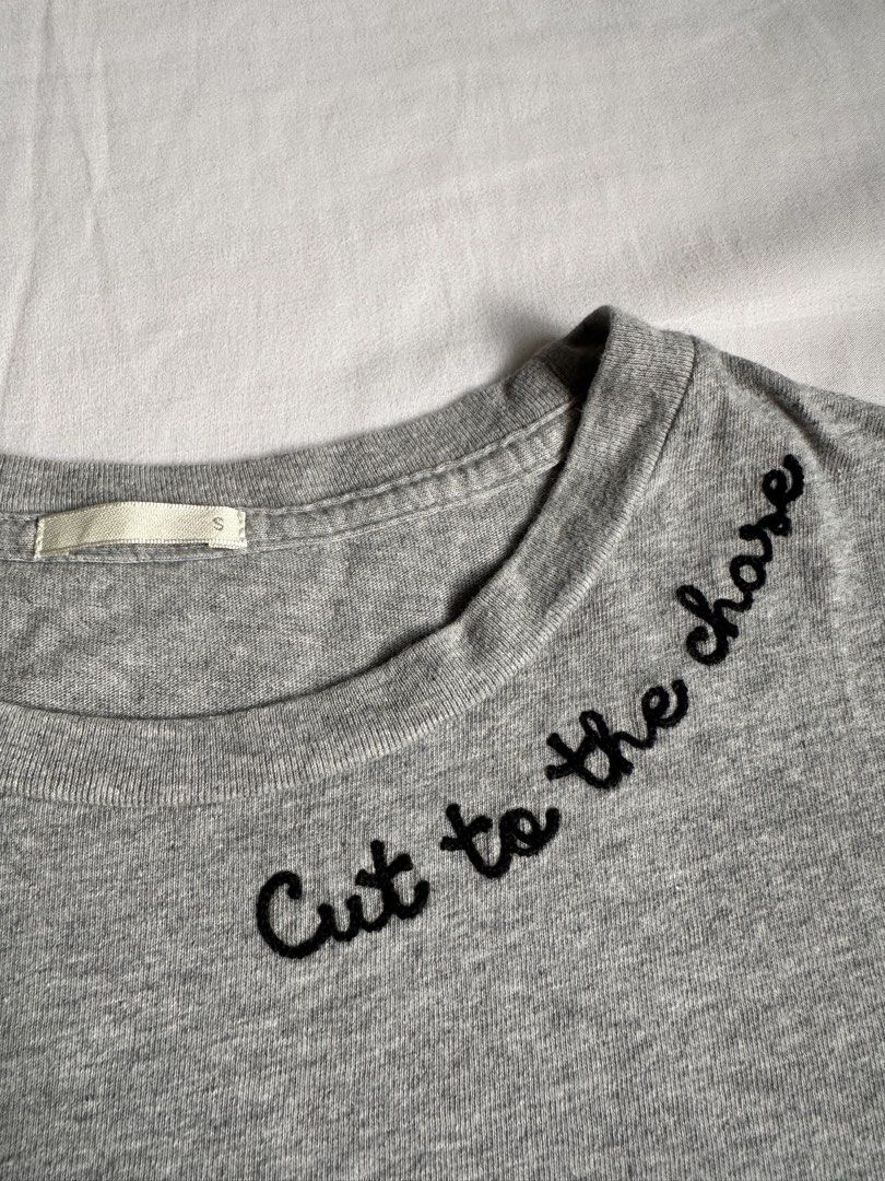GU Grey T-shirt (Category: Tshirts & Polo Shirts ) located in Bacolod City. Submitted by pym_shops (Listing ID 1461701451, Image 2). Description: - Brand: GU - Color: Grey - Design: "Cut to the chase" embroidery on left chest - Style: Simple, casual - Occasion: Everyday wear - Size: S.