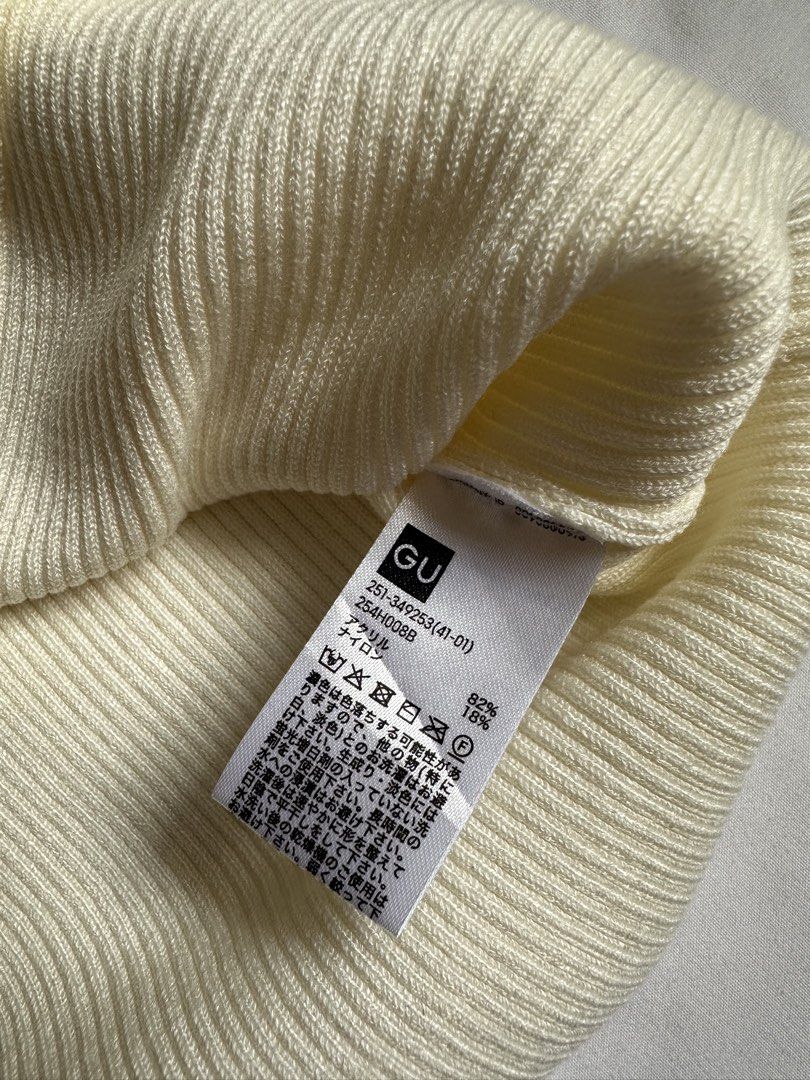GU Ribbed Knit Tank Top (Category: Sleeveless) located in Bacolod City. Submitted by pym_shops (Listing ID 1461701624, Image 3). Description: - GU Cream Ribbed Knit Tank Top - Square neckline - Criss-cross straps at the back - Material: Polyester and Nylon blend - Comfortable and versatile for layering or standalone wear - Easy to style with various outfits - A wardrobe essential.