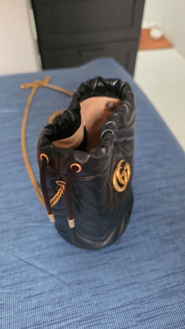 GUCCI -GG SMALL MARMONT BUCKET BAG (Category: Luxury Bags & Wallets) located in Makati City. Submitted by jadulanju71818 (Listing ID 1461645639, Image 3). Description: Black GG Logo mini brass hardware.