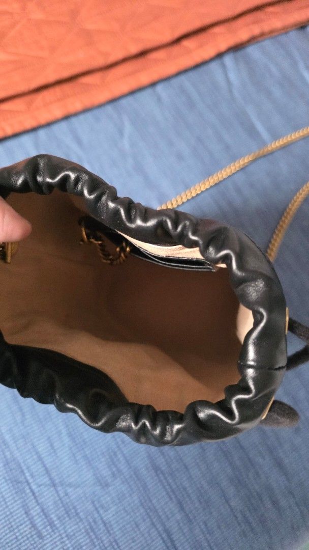 GUCCI -GG SMALL MARMONT BUCKET BAG (Category: Luxury Bags & Wallets) located in Makati City. Submitted by jadulanju71818 (Listing ID 1461645639, Image 2). Description: Black GG Logo mini brass hardware.