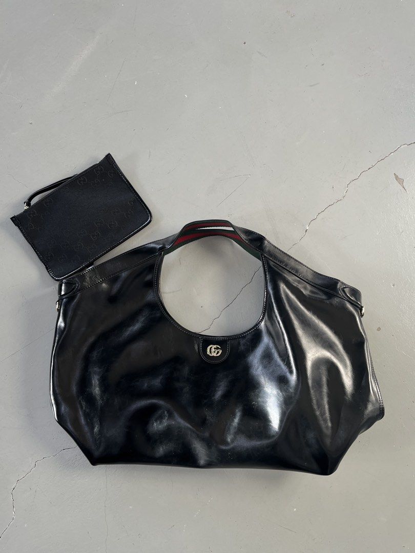 Gucci Giglio Large Tote Bag (Category: Shoulder Bags) located in San Fernando. Submitted by archivalhighlights (Listing ID 1461672153, Image 1). Description: A black glossy calfskin Gucci Giglio Large Tote Bag featuring a light gold-tone Double G logo and green/red web strap accents.